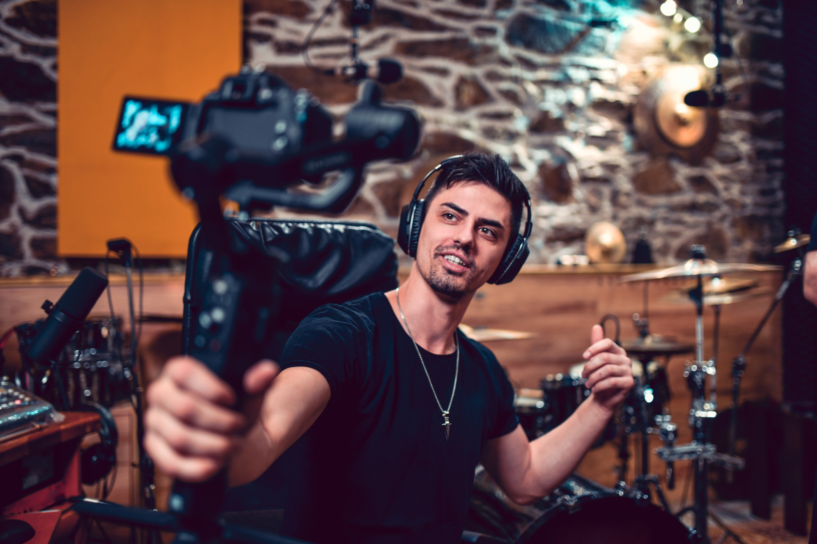 Music Producer Creating Promotional Content Video About His Studio Equipment